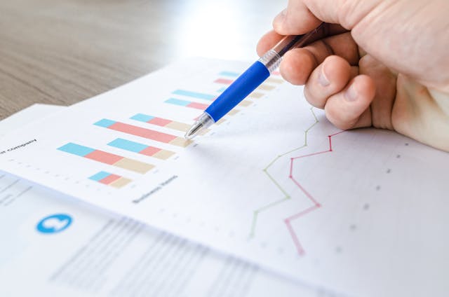 someone looking at different charts