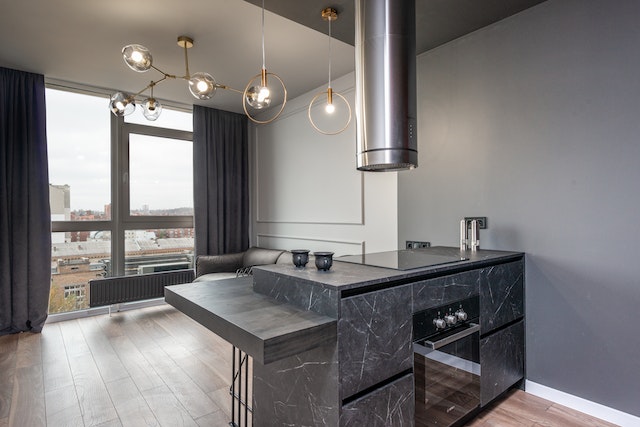 modern grey kitchen and living room apartment