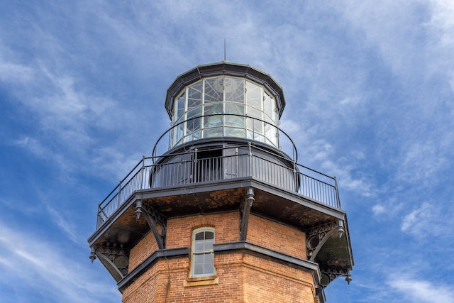 top of a lighthouse against a blue sky